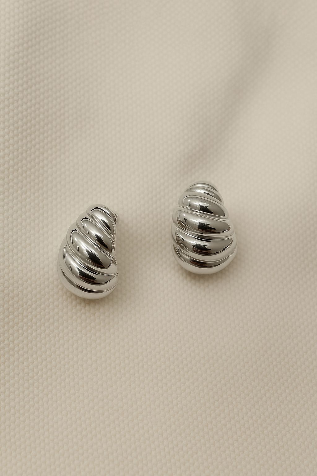 Chrome swirl Studs
